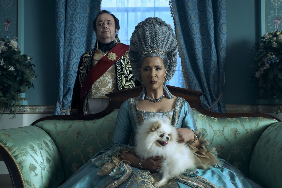 In the series, Queen Charlotte (Golda Rosheuvel) typically has a dog with her, not unlike her real-life counterpart.