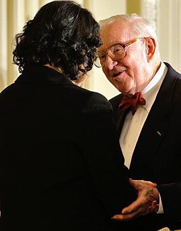 Justice Stevens with Justice Sonia Sotomayor