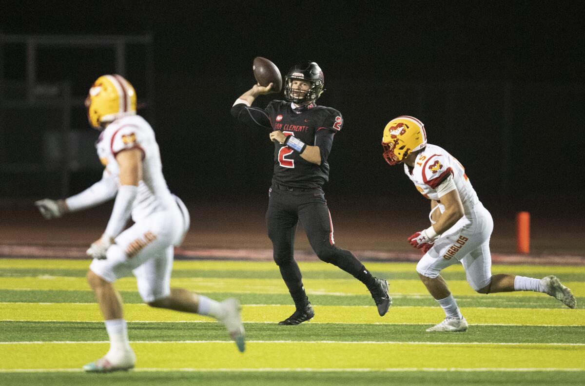 San Clemente quarterback Lachlan van Rosmalen makes a pass against Mission Viejo.