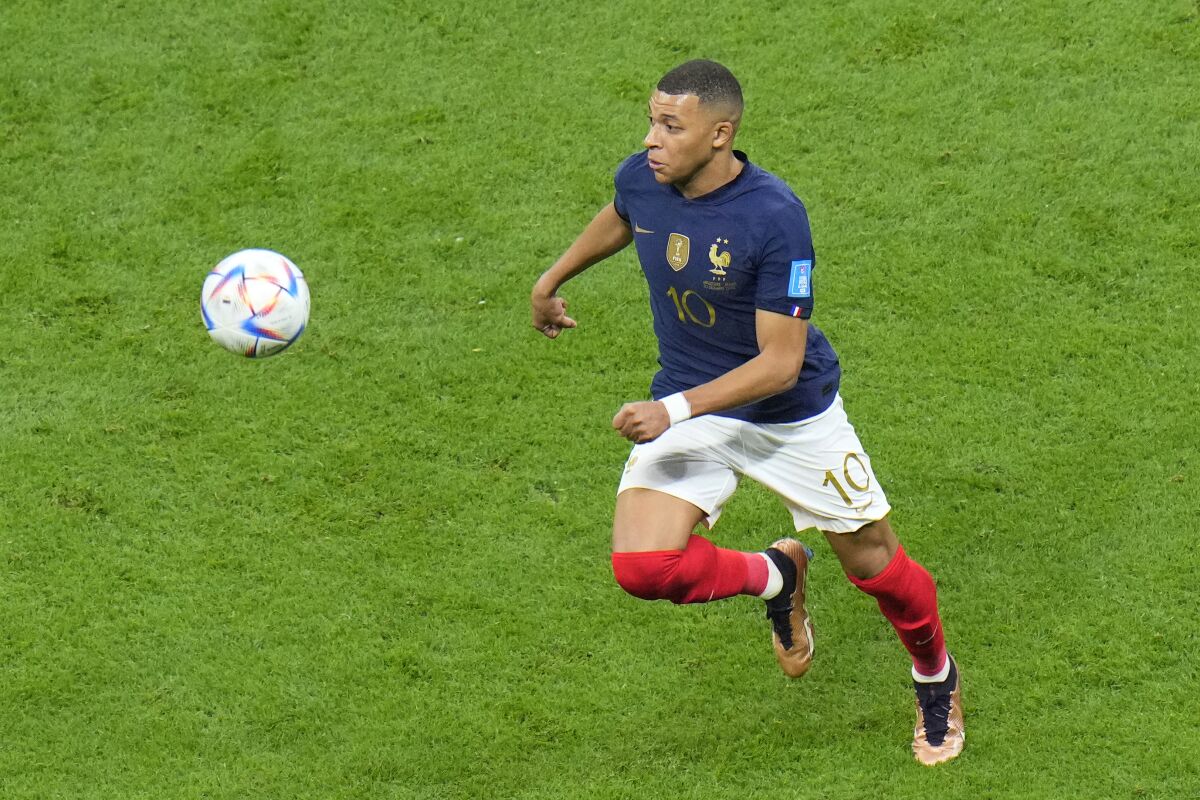 France's Kylian Mbappe in action during a World Cup quarterfinal soccer match