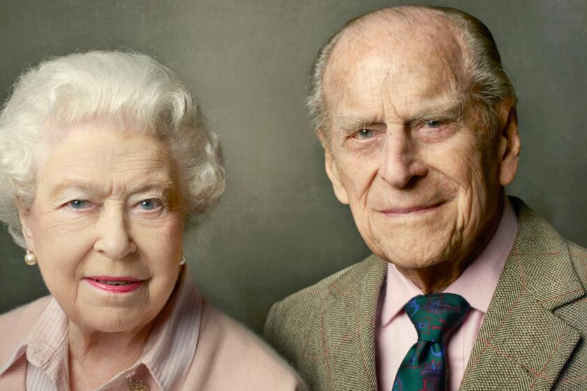 Queen Elizabeth II and Prince Philip were photographed by Annie Leibovitz in Windsor, England, for a portrait marking the queen's 90th birthday that was released in June 2016 by Buckingham Palace.