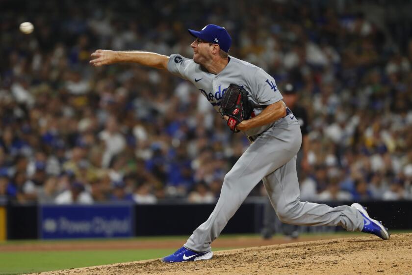 SAN DIEGO, CA - AUGUST 25: Los Angeles Dodgers Max Scherzer pitches against the San Diego Padres.