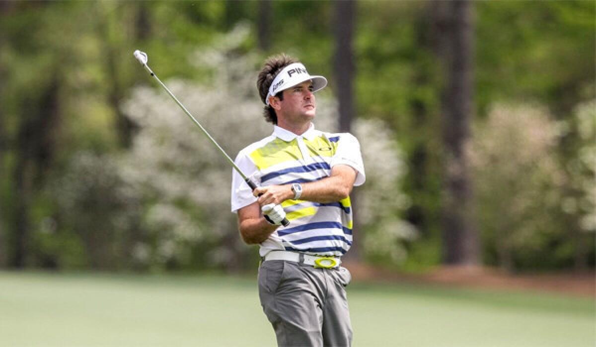 Bubba Watson watches his shot to the 12th green during the second round of the Masters at Augusta National Golf Club. Watson finished the second round with a four-under par 68.