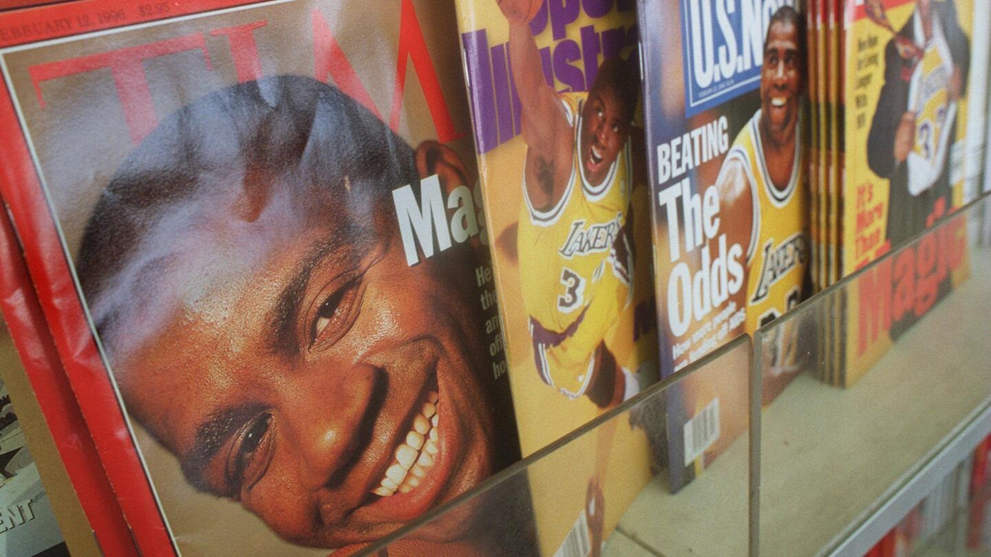 Magic Johnson adorns the cover of four weekly magazines after announcing in February 1996 that he plans to come out of retirement and join the Lakers.