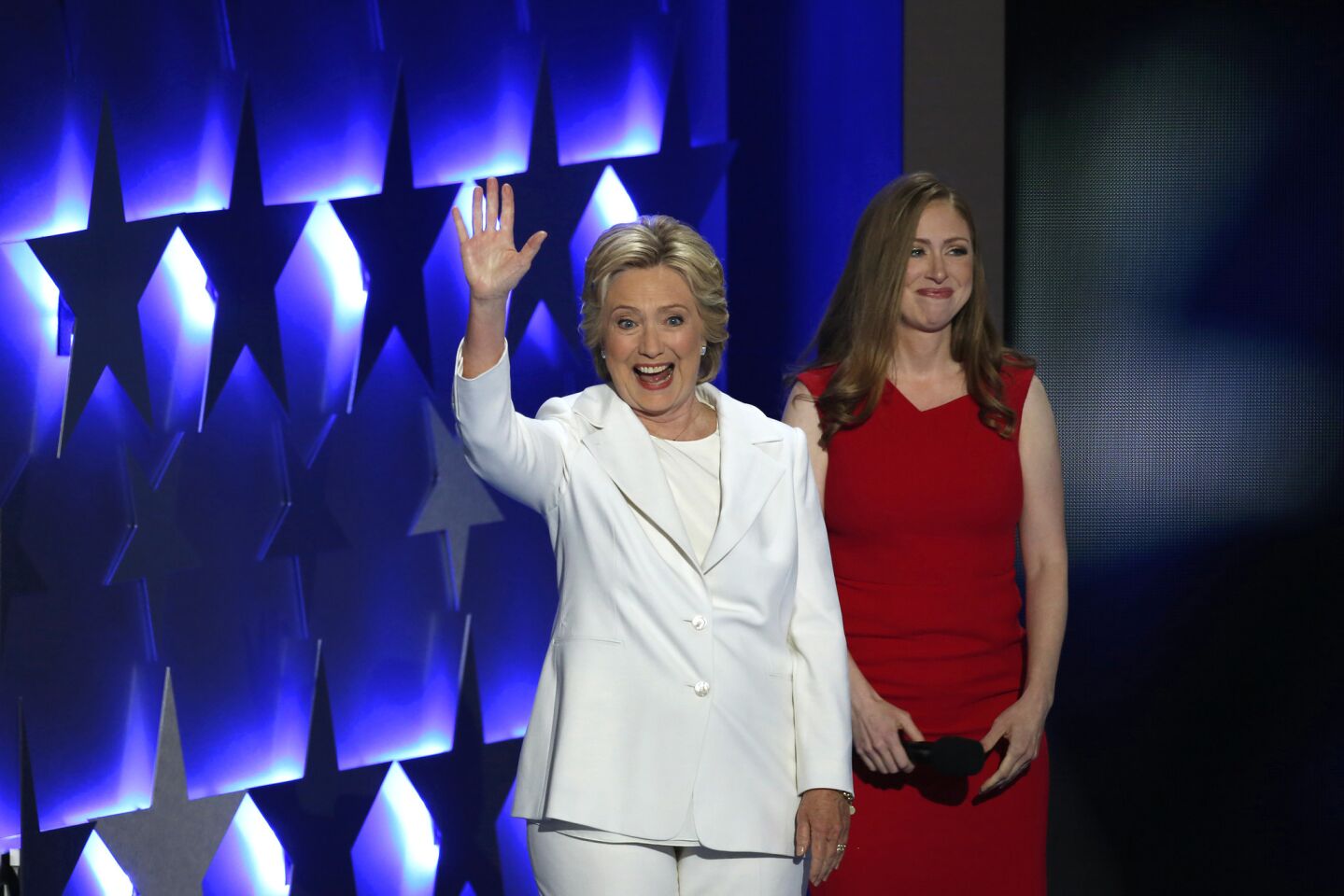 Hillary Clinton enters after her daughter Chelsea Clinton introduces her on the final night of the Democratic National Convention in Philadelphia.