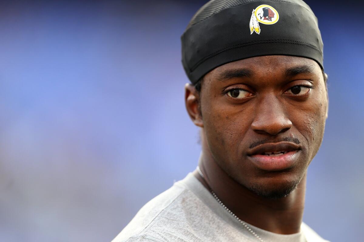 Robert Griffin III looks on prior to the start of a preseason game against the Baltimore Ravens on Aug. 29.