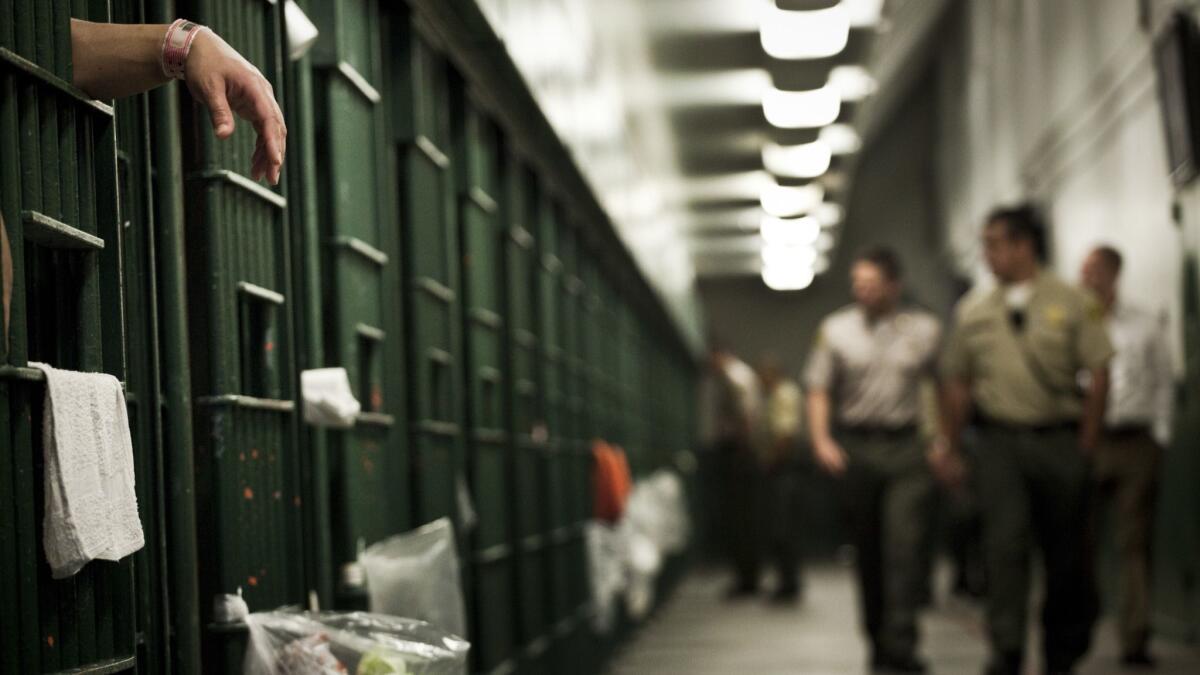 A row of cells patrolled by Los Angeles County sheriff's deputies at the Men's Central Jail in 2011.