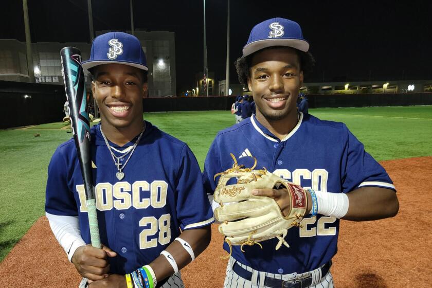 St. John Bosco's Clark twins, Miles (left) and James.