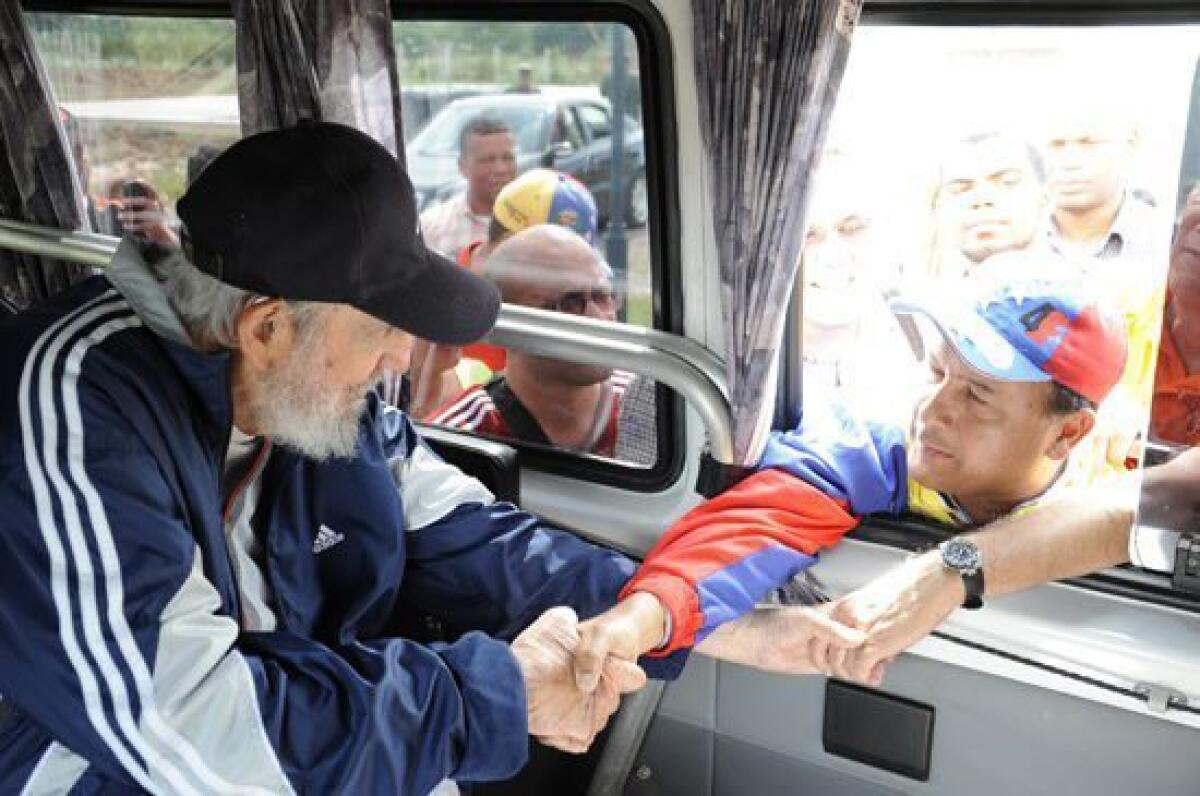 Fidel Castro greets Venezuelan tourists during a visit to a school in Havana, Cuba, on March 30. This was Castro's first public appearance in more than a year.