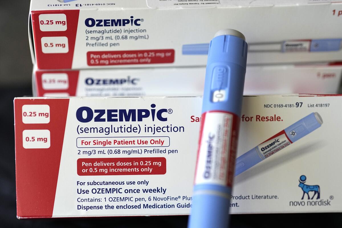 A display of an Ozempic injection device and packaging