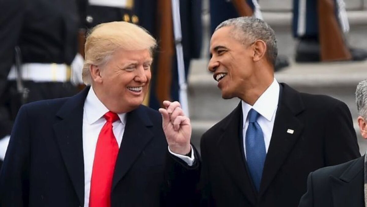 President Trump and former President Obama talk on the front steps of the U.S. Capitol after Trump's swearing-in Jan. 20.