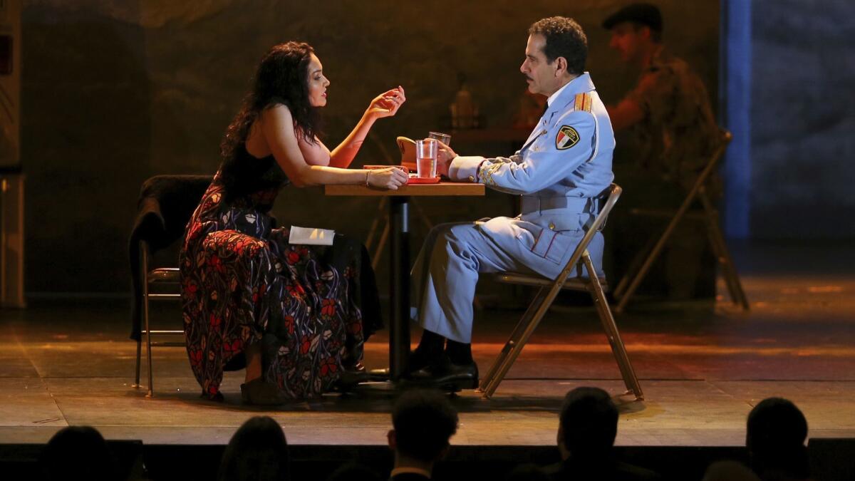 Katrina Lenk and Tony Shalhoub, from the cast of "The Band's Visit," perform at the 72nd Tony Awards at Radio City Music Hall on Sunday.