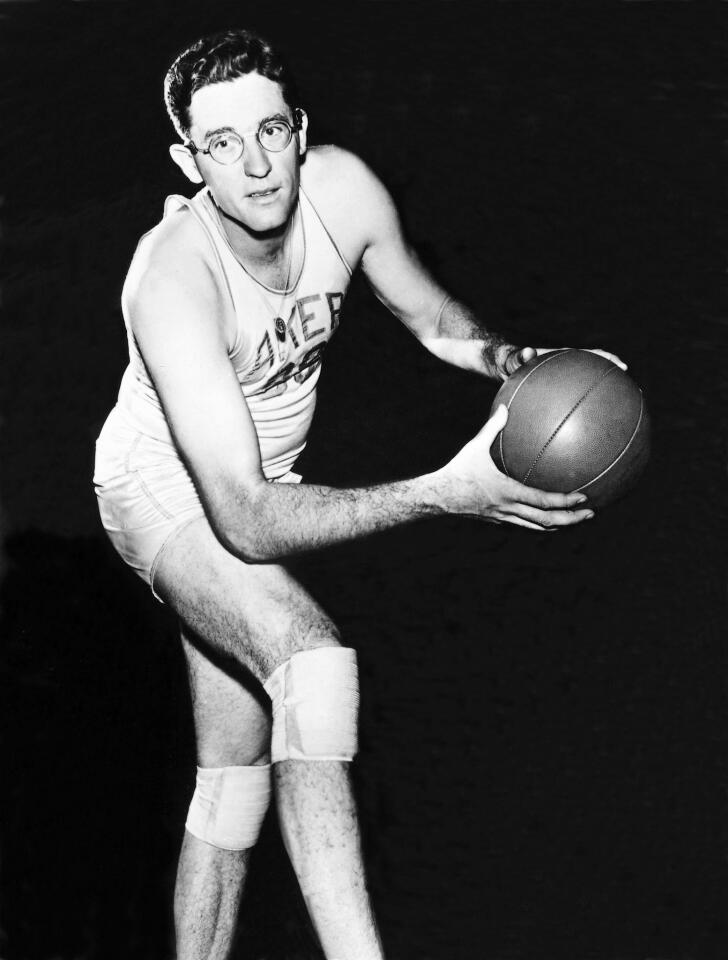 League officials doubled the width of the lane to keep the 6-foot-10, 245-pound Mikan from stationing himself beneath the basket for easy points. He still led the league in scoring three times. Commissioner David Stern once called Mikan, who died in 2005, the NBA's "first true superstar."