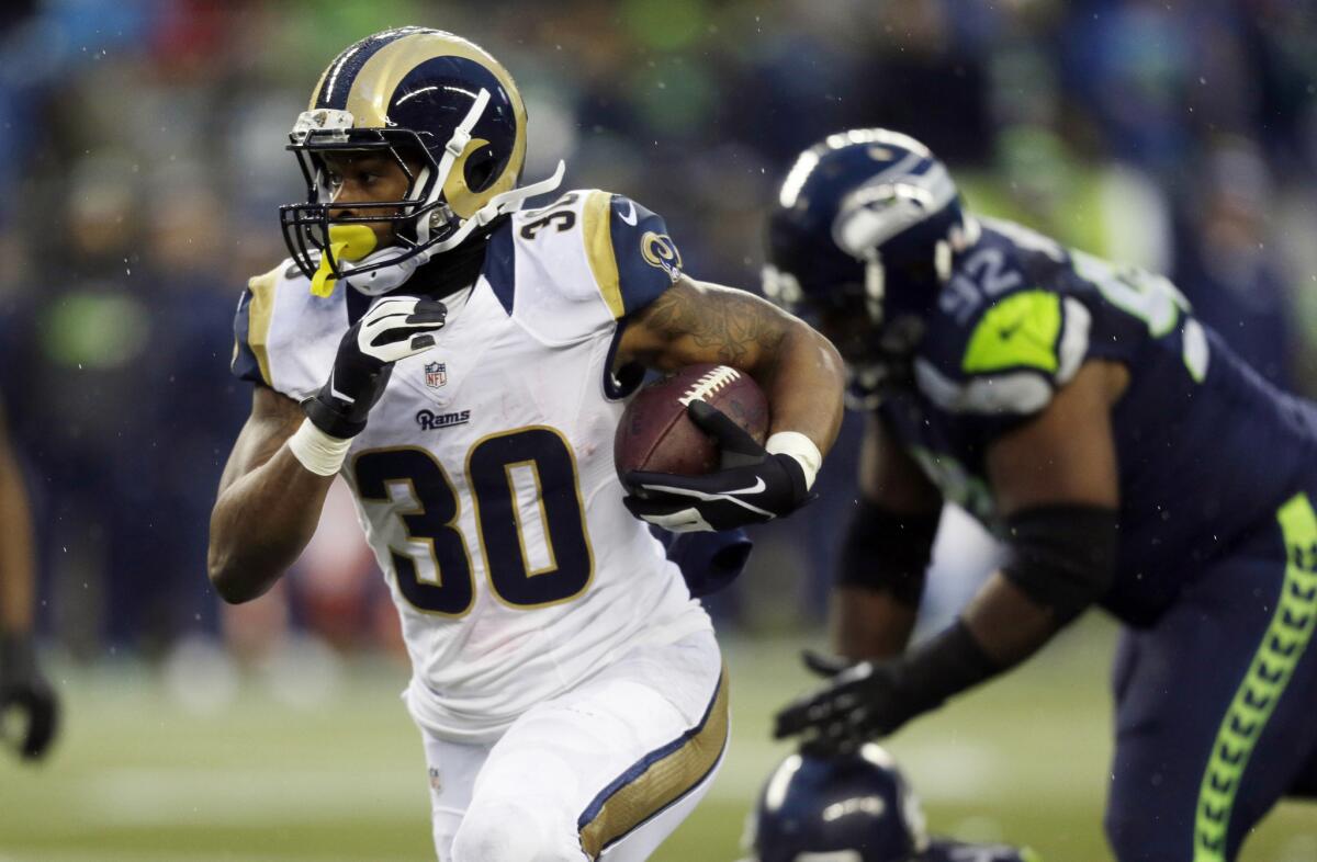 Rams running back Todd Gurley carries the ball against the Seattle Seahawks during a game on Dec. 27.