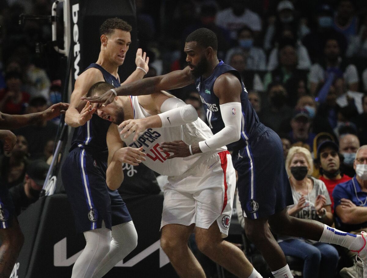 Clippers center Ivica Zubac is fouled by Dallas Mavericks forward Tim Hardaway Jr.