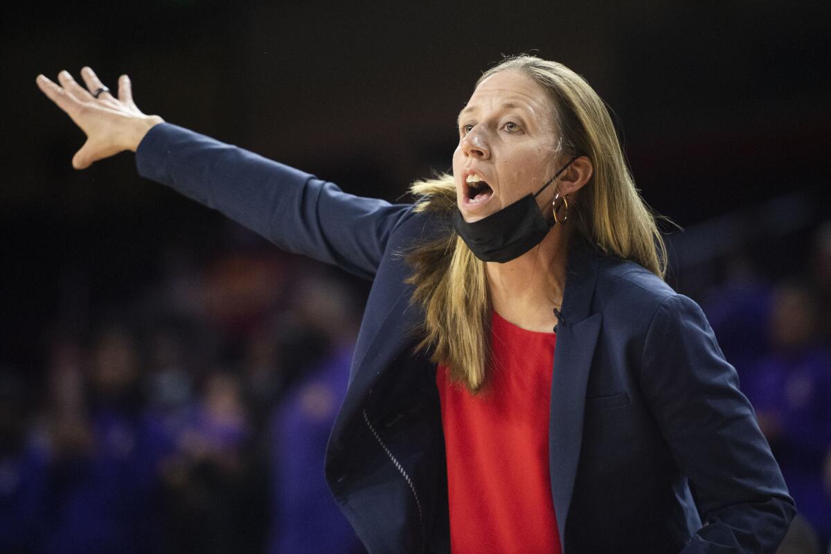Coach Lindsay Gottlieb instructs her players during a game against Hawaii.