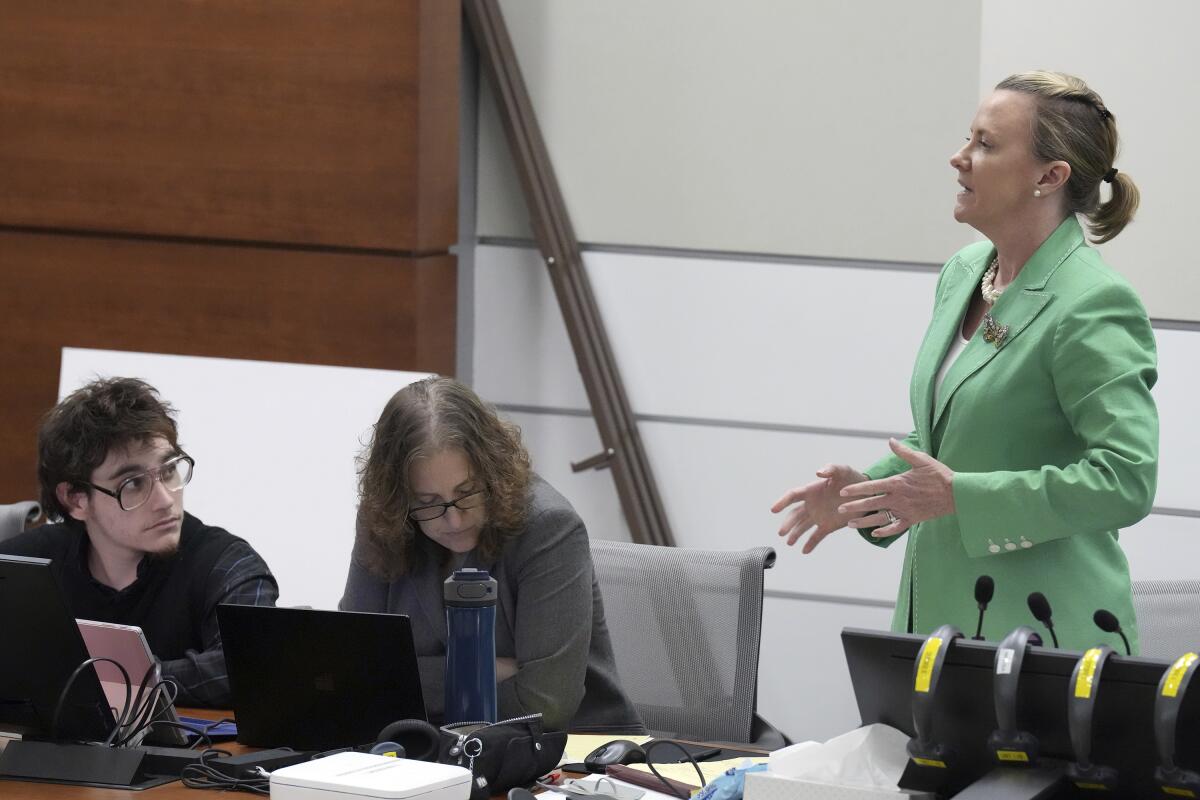 Assistant Public Defender Melisa McNeill argues for a continuance due to an ill member of the legal team during jury selection in the penalty phase of the trial of Marjory Stoneman Douglas High School shooter Nikolas Cruz at the Broward County Courthouse in Fort Lauderdale on Monday, June 6, 2022. Cruz previously plead guilty to all 17 counts of premeditated murder and 17 counts of attempted murder in the 2018 shootings. (Amy Beth Bennett/South Florida Sun Sentinel via AP, Pool)
