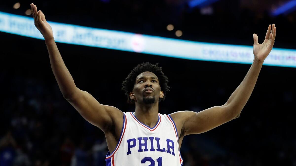 Philadelphia's Joel Embiid gestures to the crowd during a game against Houston on Jan. 27.