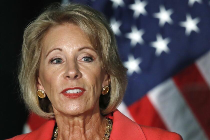 FILE - In this Sept. 7, 2017, file photo, Education Secretary Betsy DeVos speaks at George Mason University Arlington, Va., campus. On Friday, May 25, 2018, a federal court ruled that the Education Department violated privacy laws with regard to students defrauded by the Corinthian for-profit college chain. (AP Photo/Jacquelyn Martin, File)