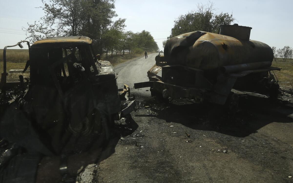 Destroyed Ukrainian military vehicles near the village of Novokaterynivka, in eastern Ukraine, on Sept. 2.