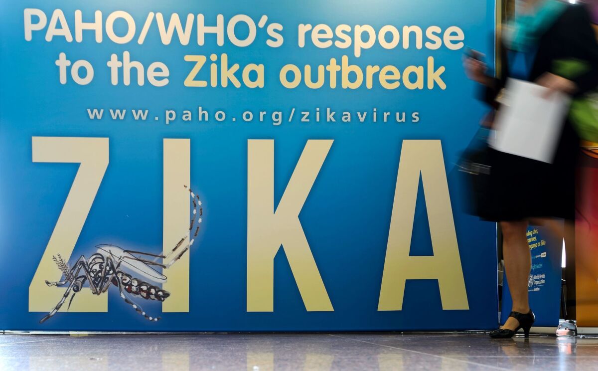 A banner introduces an international conference on Zika, opening this week in Geneva, Switzerland.