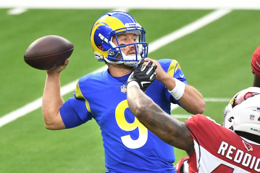 INGLEWOOD, CALIFORNIA JANUARY 3, 2021-Rams quarterback John Wolford throws a pass.