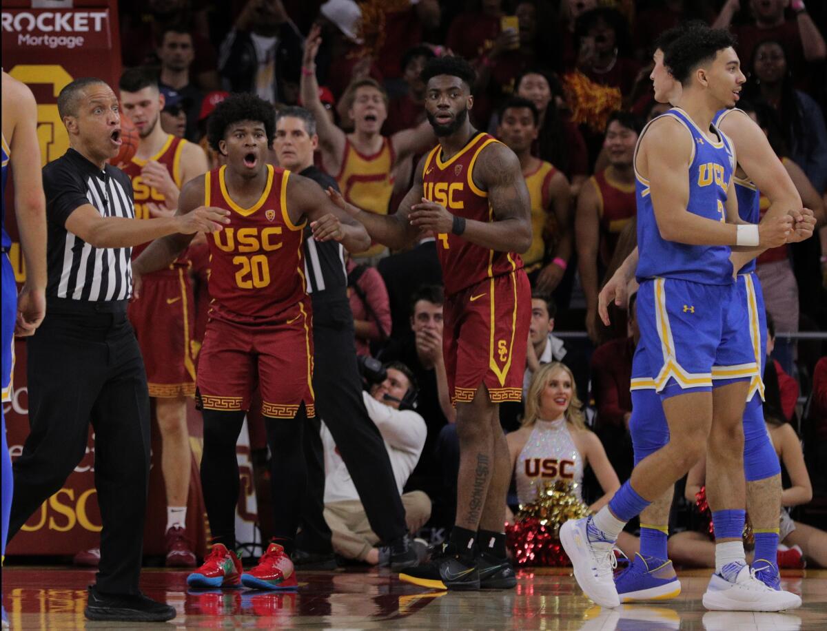 USC guard Ethan Anderson (20) reacts after being called for a foul with nine seconds left in a game against UCLA on March 7 at the Galen Center.