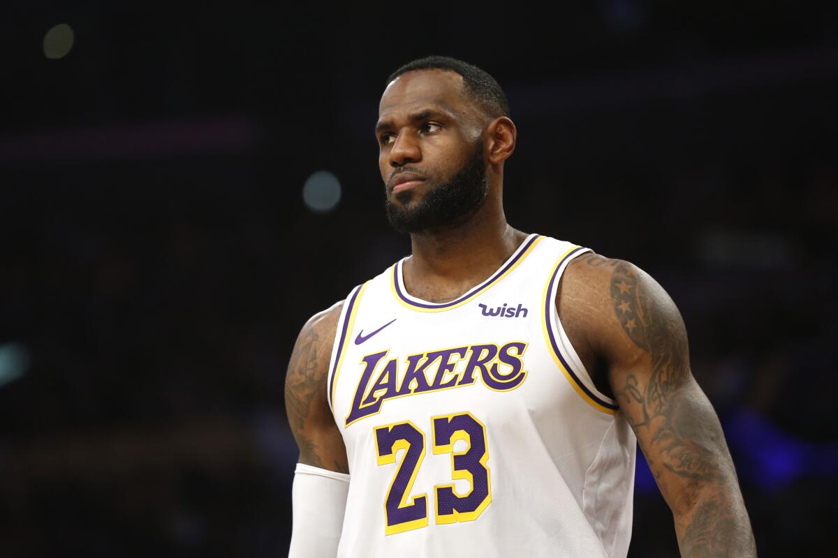 LOS ANGELES, CALIFORNIA - DECEMBER 08: LeBron James #23 of the Los Angeles Lakers looks on during the first half against the Minnesota Timberwolves at Staples Center on December 08, 2019 in Los Angeles, California. NOTE TO USER: User expressly acknowledges and agrees that, by downloading and or using this photograph, User is consenting to the terms and conditions of the Getty Images License Agreement. (Photo by Katharine Lotze/Getty Images) ** OUTS - ELSENT, FPG, CM - OUTS * NM, PH, VA if sourced by CT, LA or MoD **