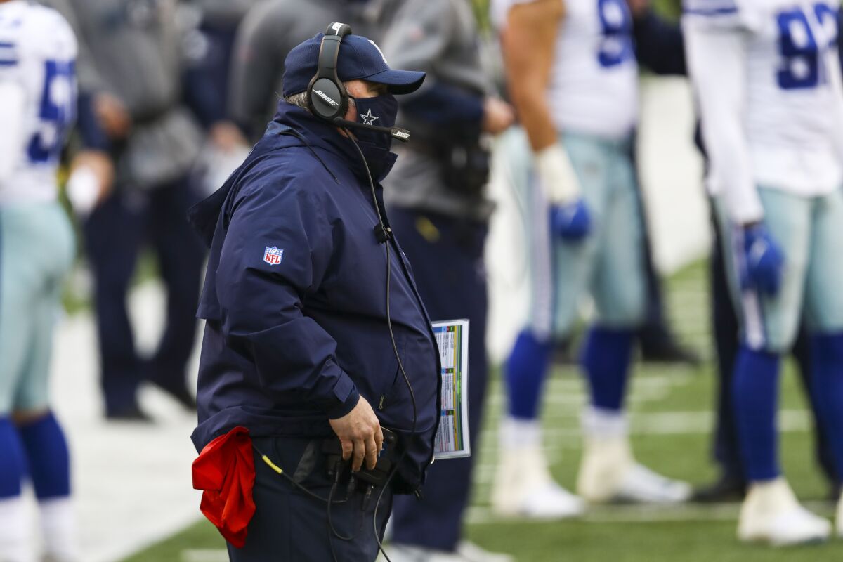 Dallas Cowboys head coach Mike McCarthy on the sideline in the first half of an NFL football game against the Cincinnati Bengals in Cincinnati, Sunday, Dec. 13, 2020. (AP Photo/Aaron Doster)