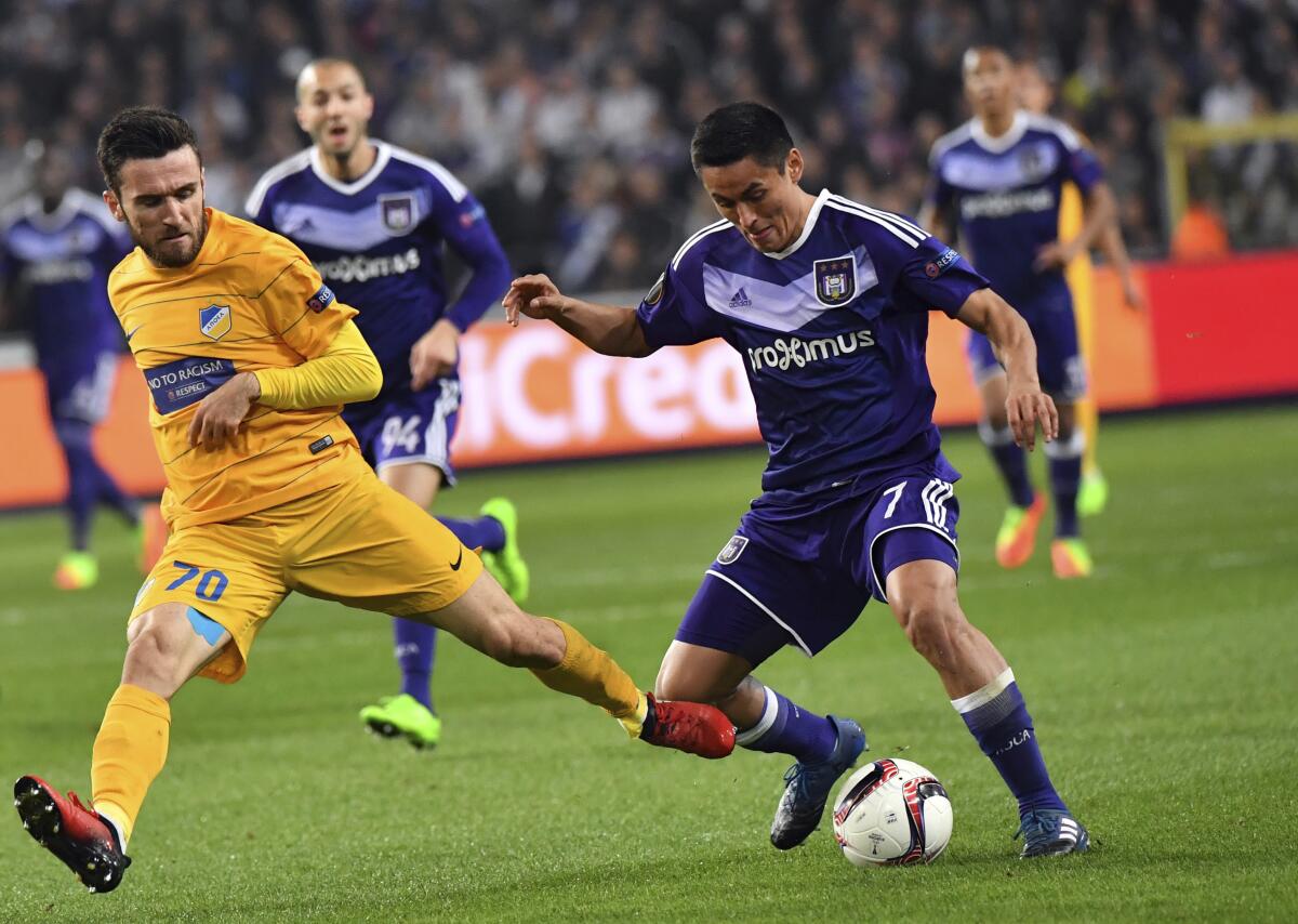 Anderlecht's Andy Najar, right, battles APOEL's Yannis Gianniotas during a Europa League match March 16, 2017.