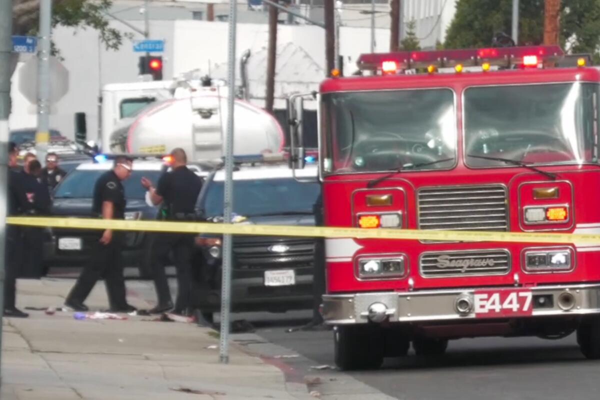 A police pursuit Sunday morning in downtown L.A. ended in the shooting of a driver who L.A. police say was armed.