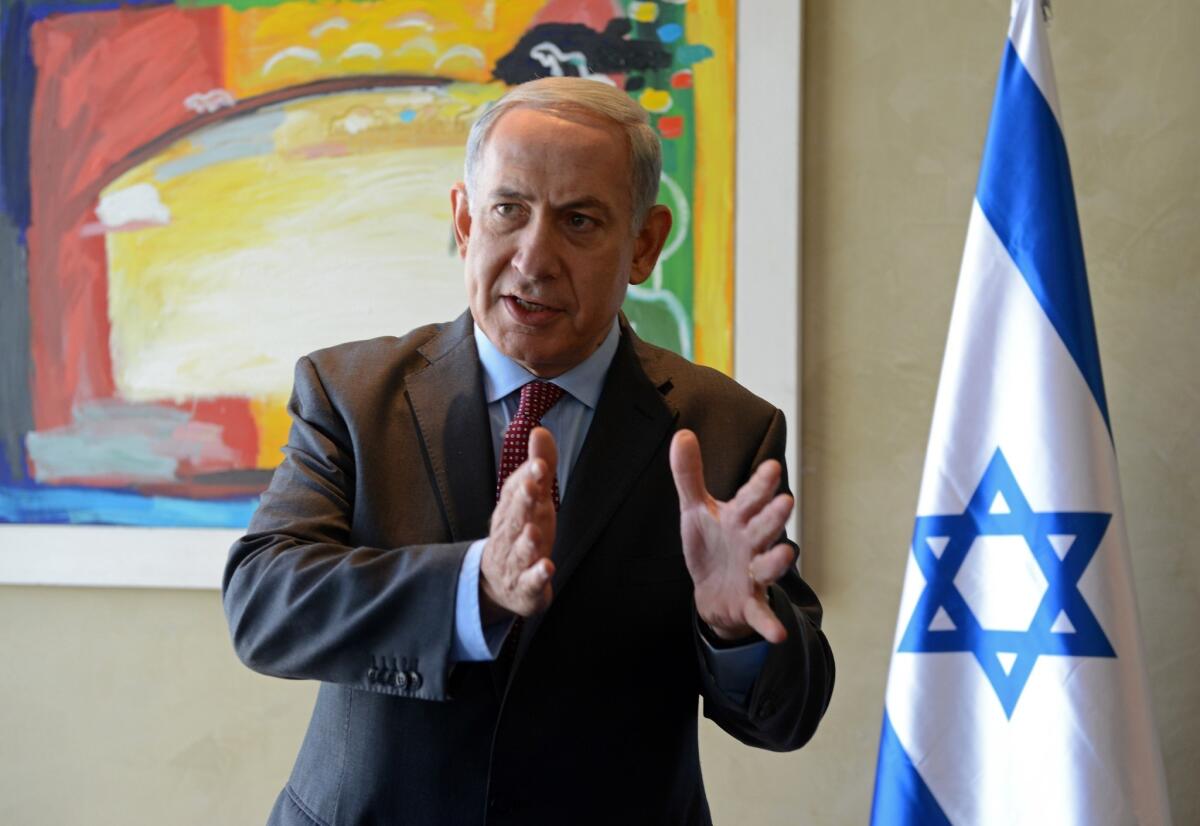Israeli Prime Minister Benjamin Netanyahu speaks to reporters after his meeting with U.S. Secretary of State John F. Kerry at Ben Gurion Airport near Tel Aviv.