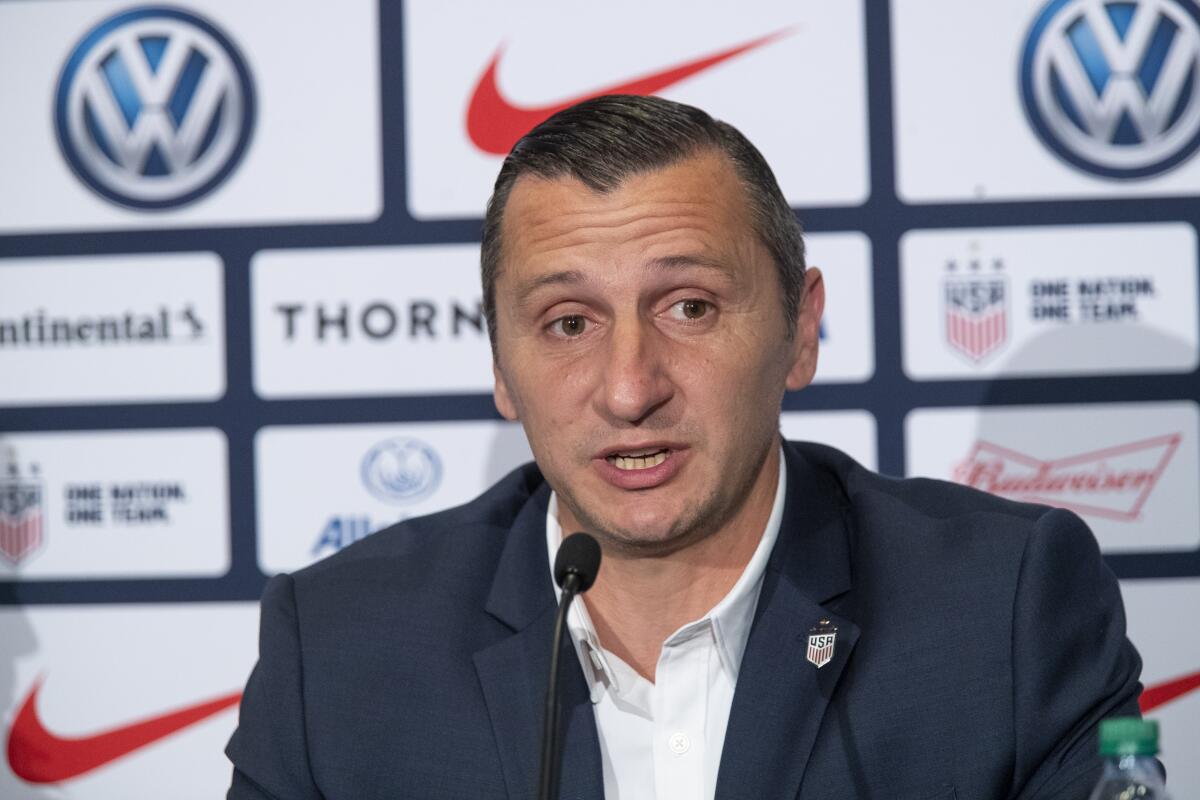 Vlatko Andonovski speaks during a news conference