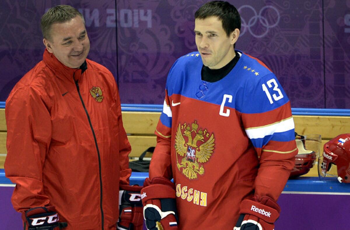 Russia captain Pavel Datsyuk talks to a coach during a training session at Bolshoy Arena on Monday.