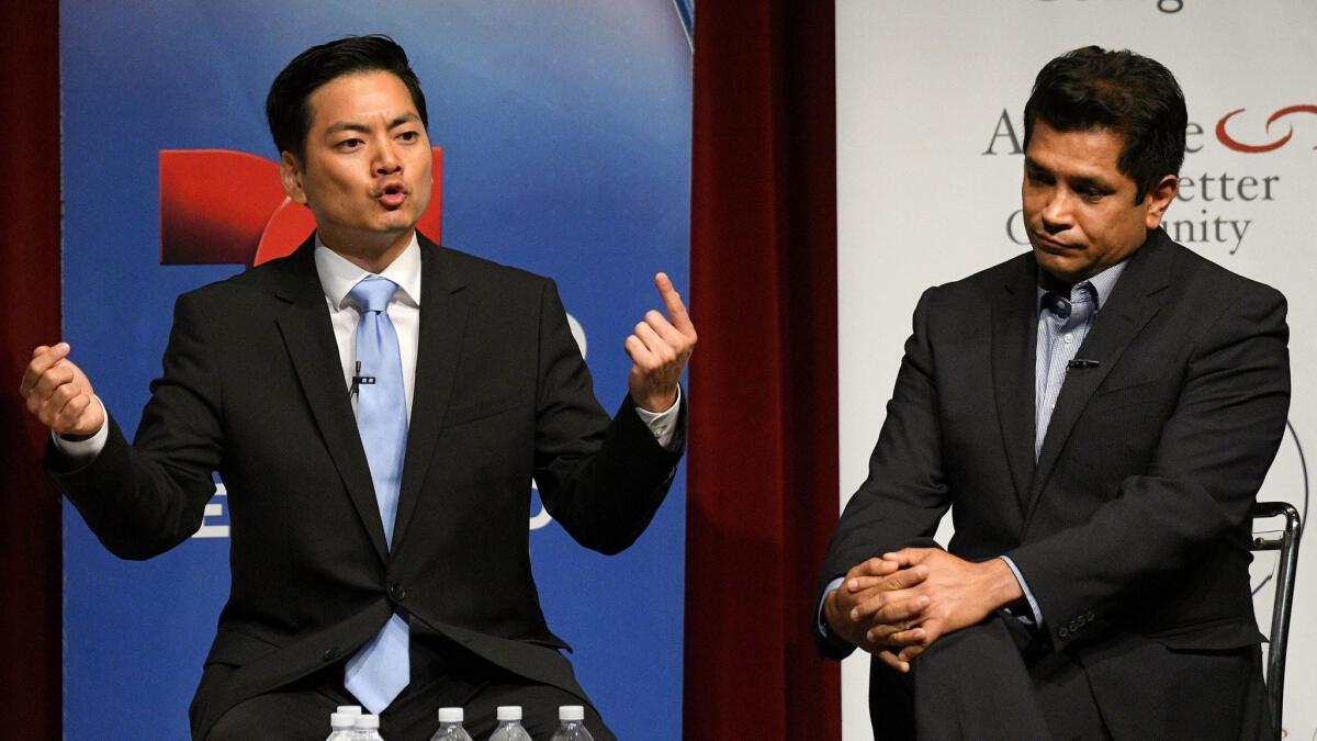 Robert Lee Ahn, left, and Assemblyman Jimmy Gomez, both Democrats, at their only debate on May 25 at Occidental College.