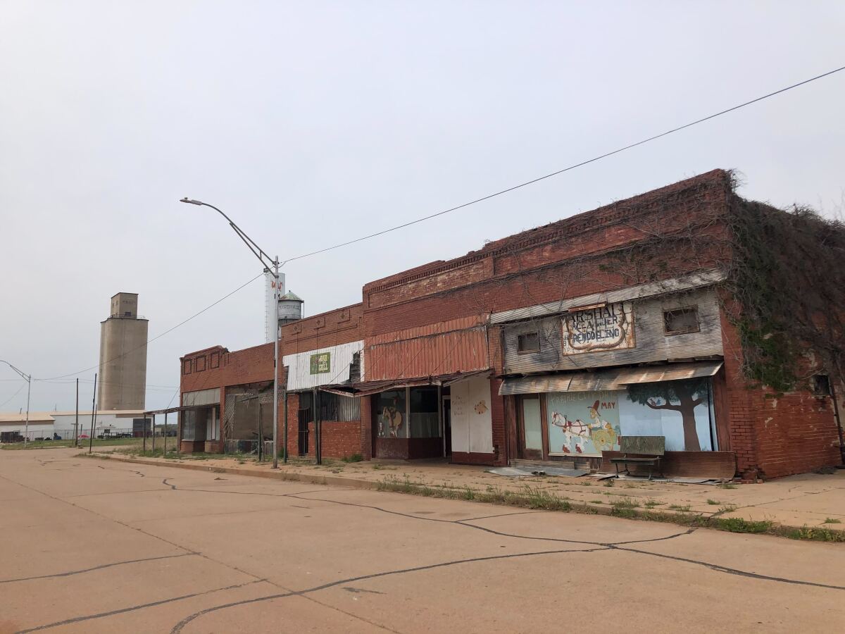 A view of brick buildings along a street 