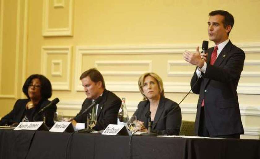 Los Angeles mayoral candidates Jan Perry, left, Kevin James, Wendy Greuel and Eric Garcetti debate in Hollywood Sept. 19.