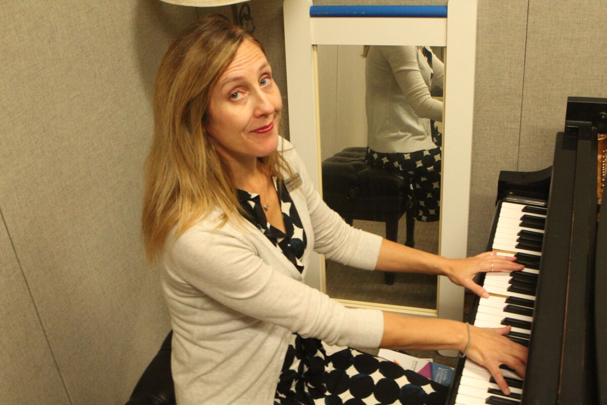 Weaver plays Beethoven's 'Moonlight Sonata' in the rehearsal room she uses every morning before work.