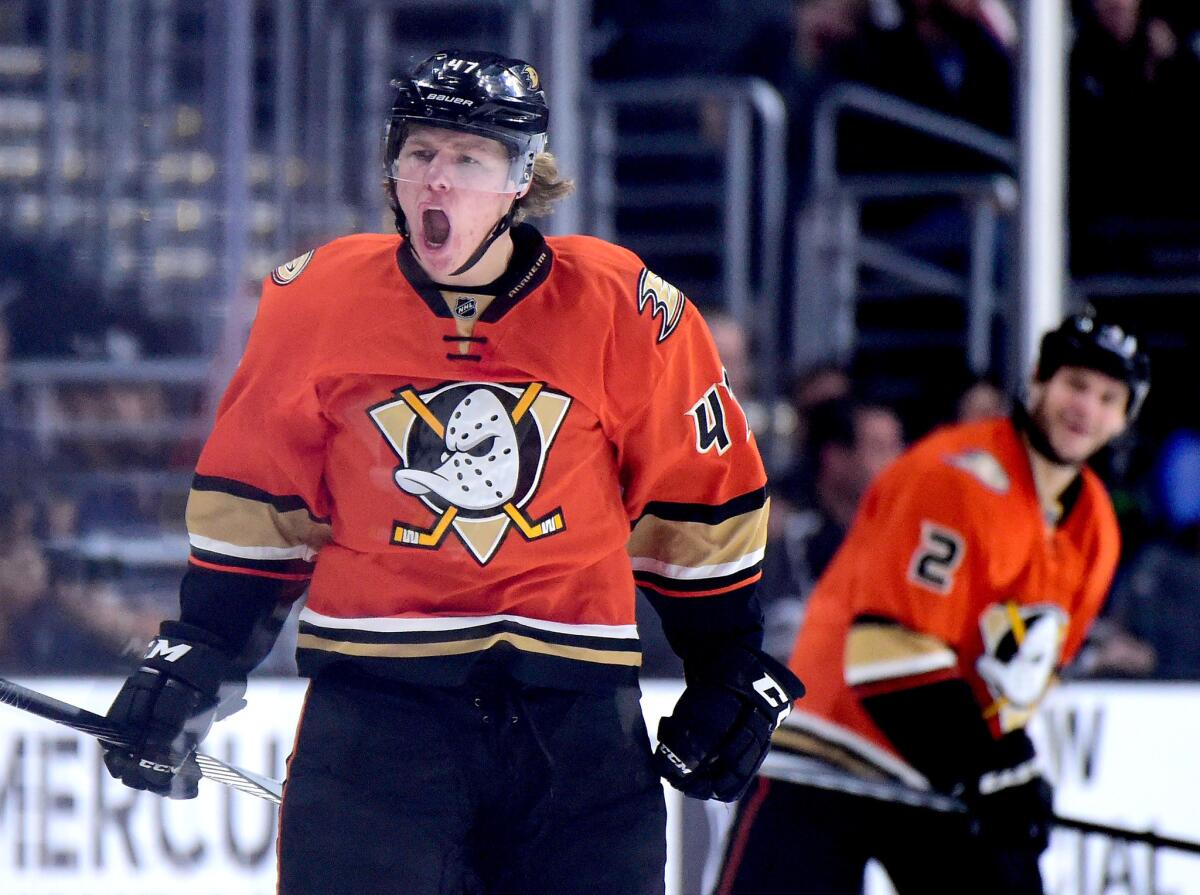 Defenseman Hampus Lindholm, left, and the Ducks are trying to work out a deal worth around $6 million per season.