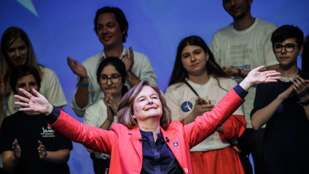 Nathalie Loiseau, a French candidate for representative to the European Union, gestures to supporters after a speech May 24 in Paris.