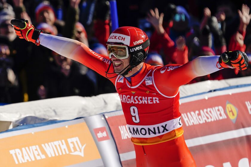 Switzerland's Ramon Zenhaeusern celebrates winning an alpine ski, men's World Cup slalom in Chamonix, France, Saturday, Feb. 4, 2023. (AP Photo/Pier Marco Tacca)