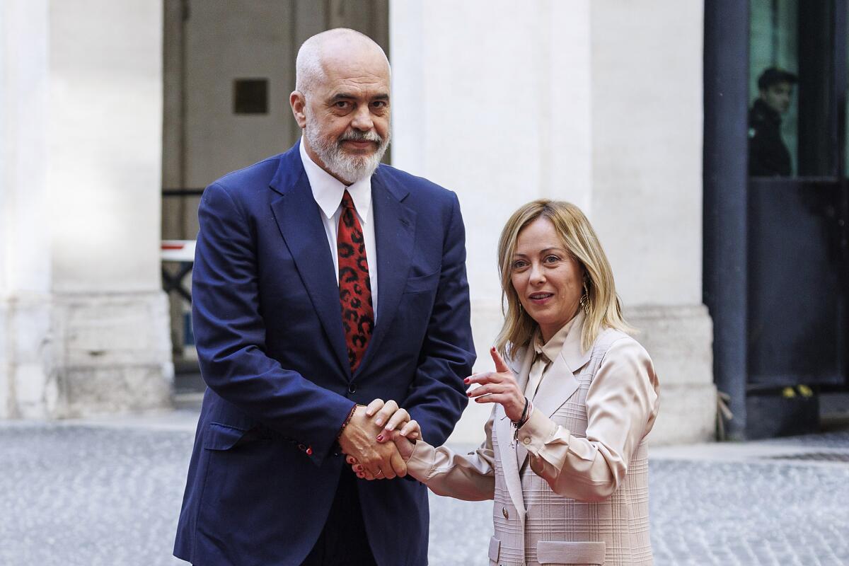 Italian Prime Minister Giorgia Meloni shakes hands with Albanian Prime Minister Edi Rama
