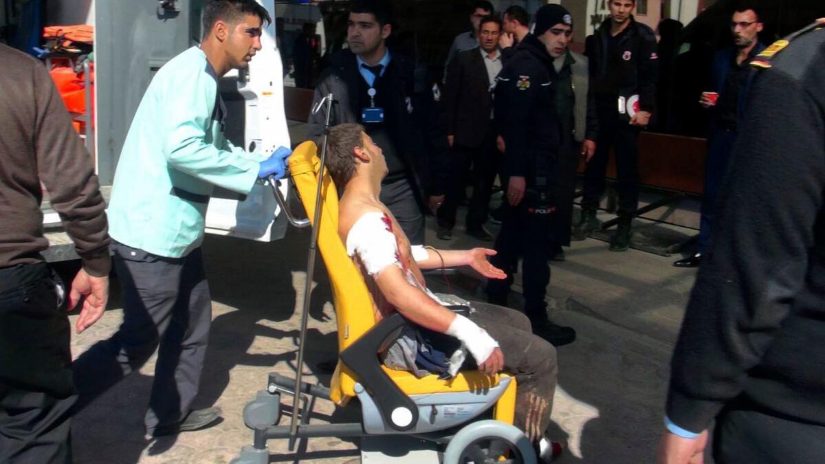 A Syrian man wounded in a blast near the town of Al Bab is wheeled into a hospital in Kilis, Turkey, on Feb. 24.