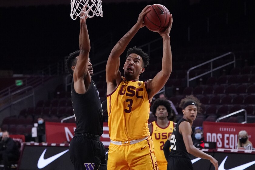 USC forward Isaiah Mobley shoots against Washington.