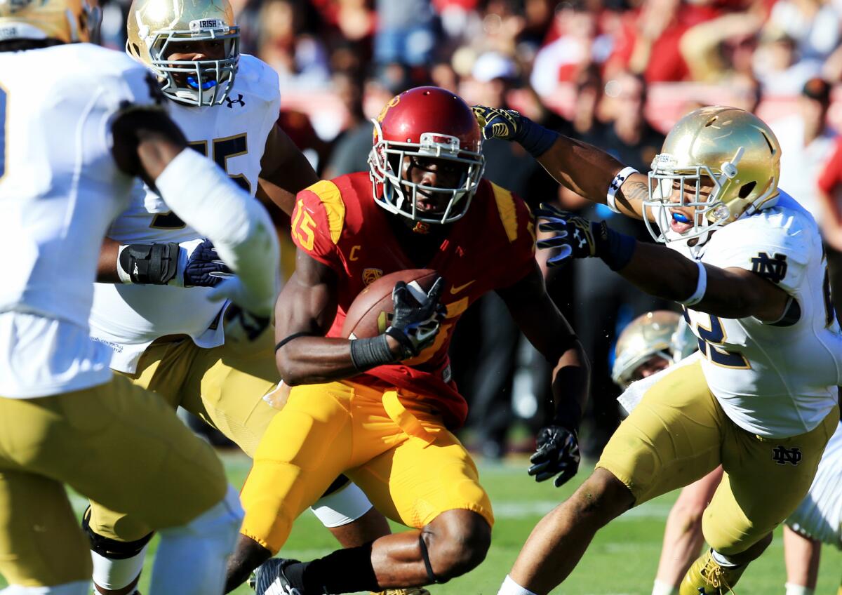 USC receiver Nelson Agholor heads toward the end zone Nov. 29 against Notre Dame at the Coliseum.