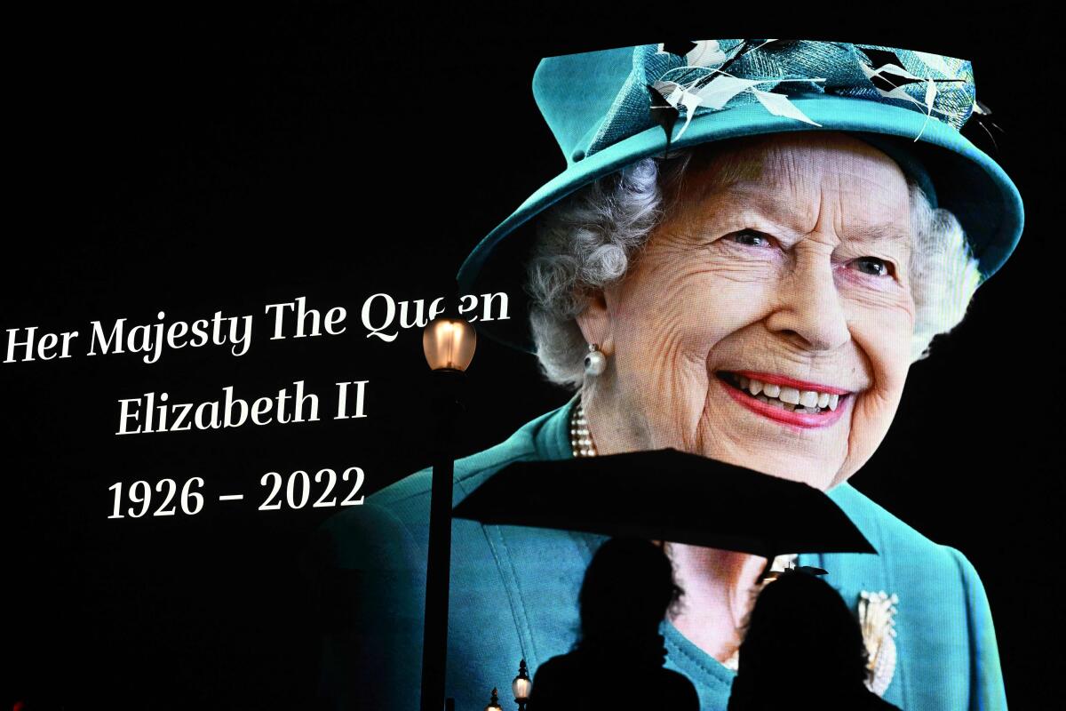 An image of Queen Elizabeth II displayed at Piccadilly Circus in central London on Thursday.
