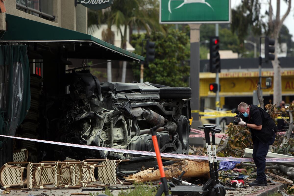 A car crashed into the front of a restaurant in Silver Lake.