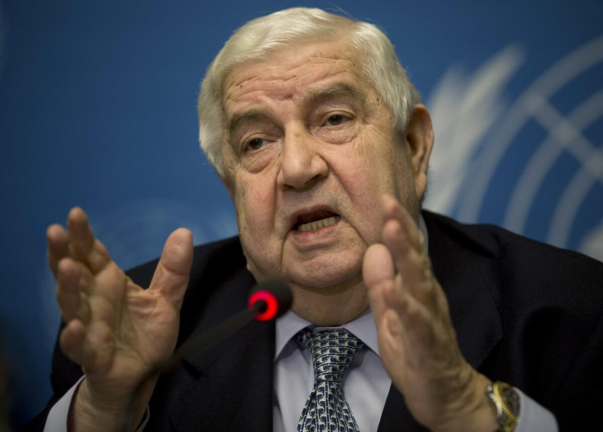 U.S. officials informed the Syrian government of Washington's plans to bomb suspected Islamic State militant sites within its borders in a note conveyed to Foreign Minister Walid Moallem, shown in Geneva in January.