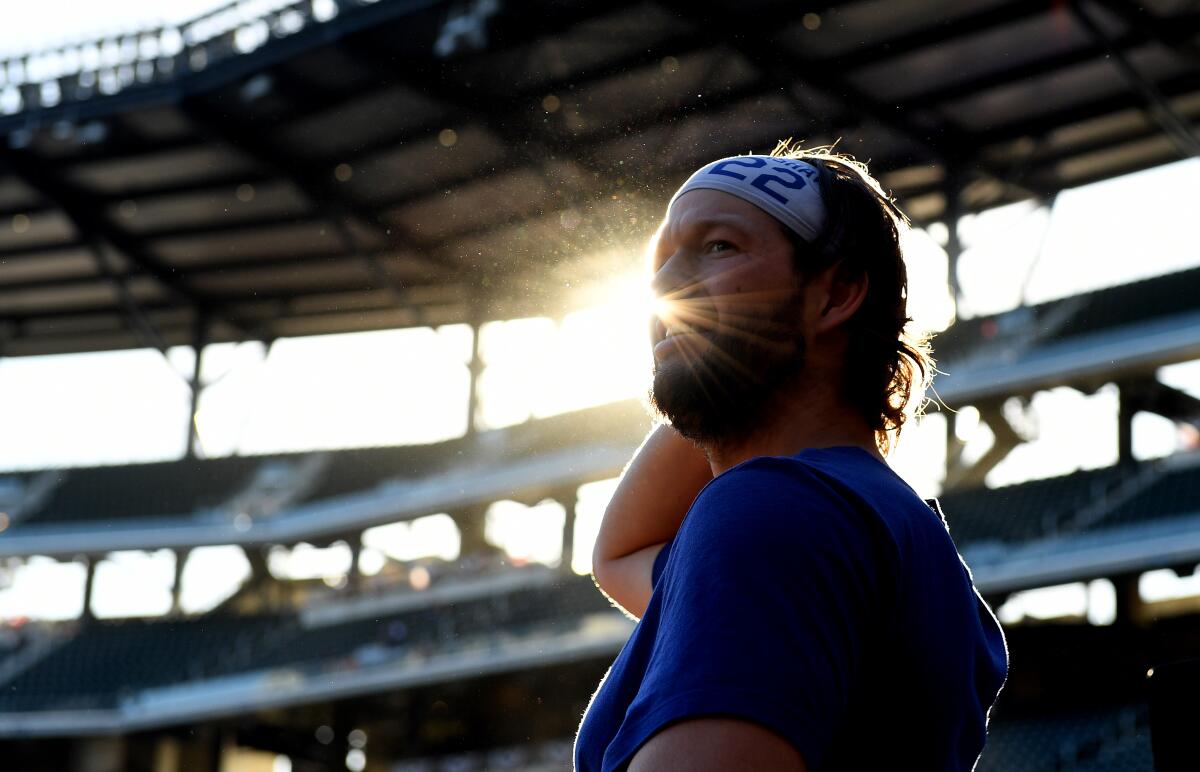Dodgers pitcher Clayton Kershaw takes in the scene before Game 1 of the NLCS in Atlanta last season.