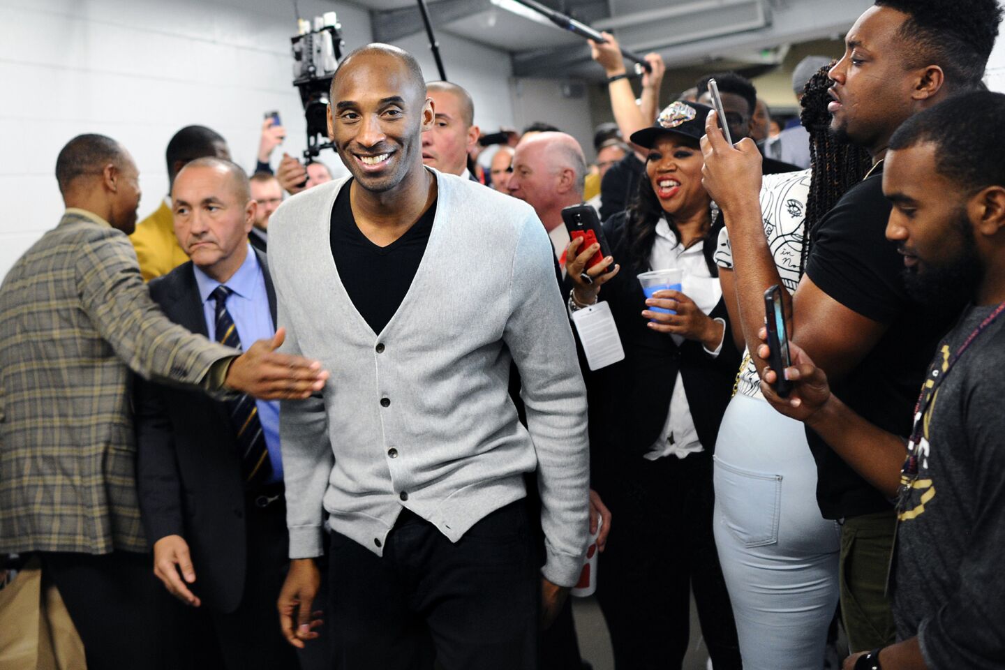 Kobe Bryant walks down a hallway at Smoothie King Center after the Lakers' game against the Pelicans.